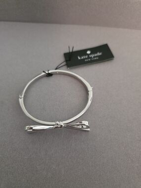 kate spade silver-tone bow bangle bracelet